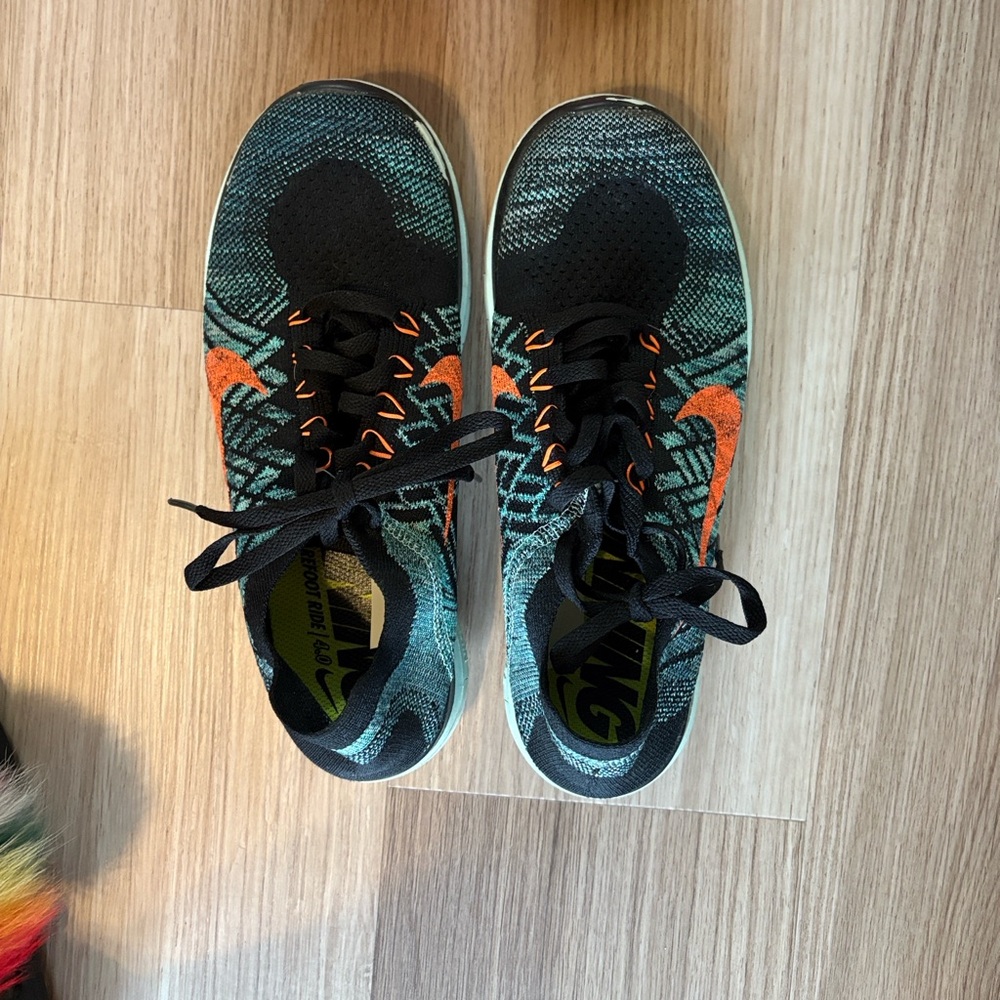 Nike Flyknit Black, Teal and Orange Athletic Sneakers